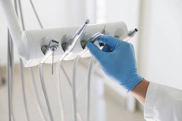 Professional Tooth Extraction technician working in Pembroke, NC